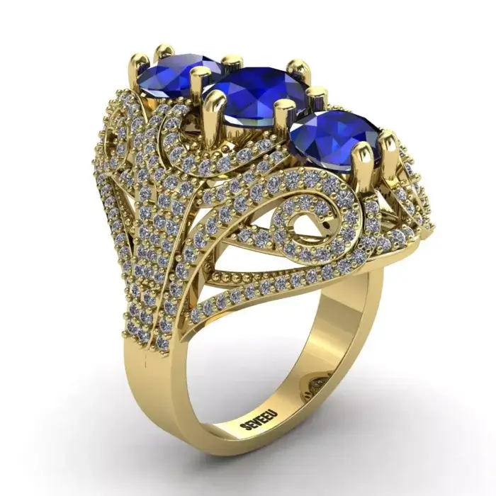 Złoty pierścionek zaręczynowy z niebieskim kamieniem