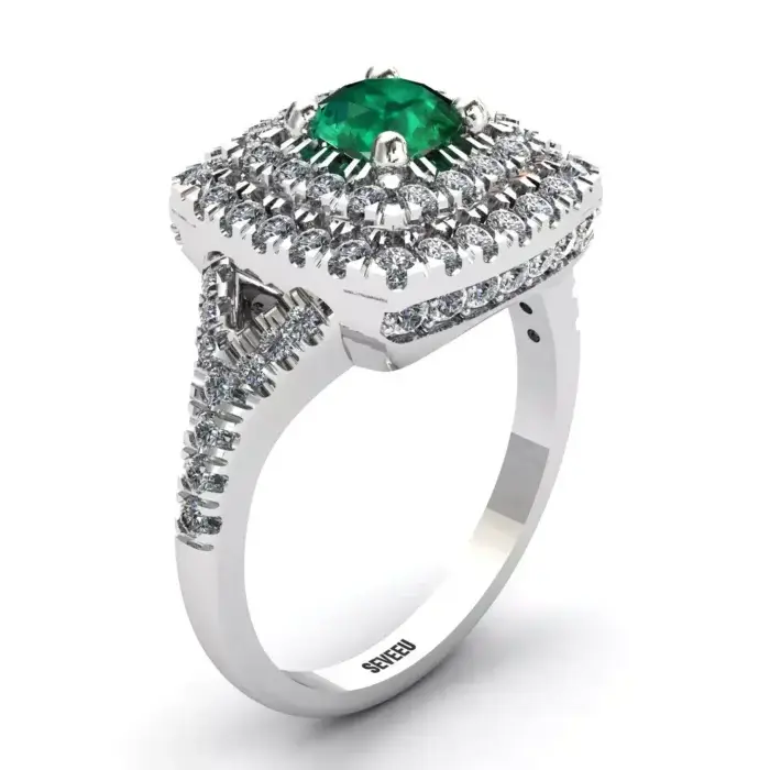 Srebrny pierścionek z zielonym szmaragdami